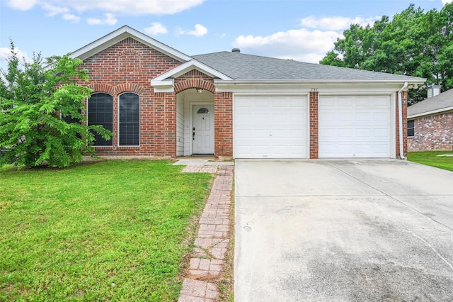view of front of home with concrete driveway, brick siding, a front lawn, and a garage