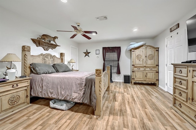 bedroom with visible vents, light wood-style floors, baseboards, recessed lighting, and a ceiling fan