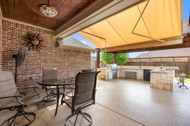 1408 Joshua Way, Granbury, TX 76048 - view of patio / terrace featuring an outdoor kitchen, fence, a sink, and a grill