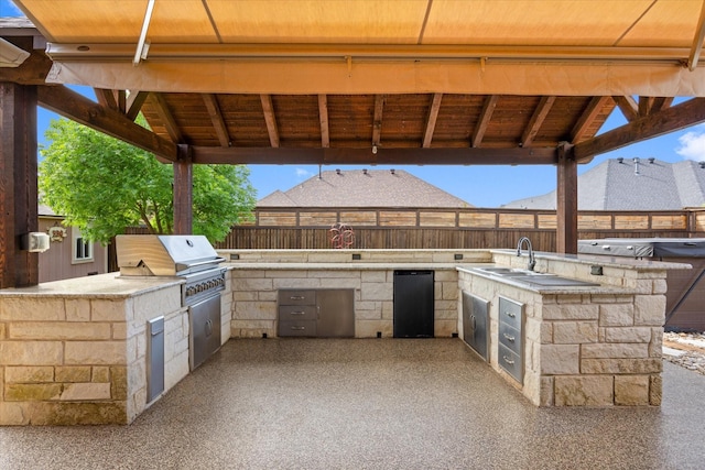 1408 Joshua Way, Granbury, TX 76048 - view of patio / terrace featuring an outdoor kitchen, fence, a sink, and area for grilling
