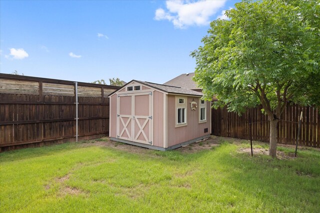 1408 Joshua Way, Granbury, TX 76048 - view of shed featuring a fenced backyard