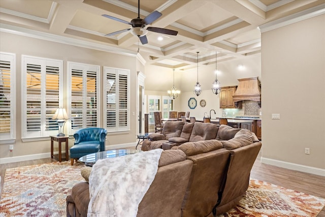 1408 Joshua Way, Granbury, TX 76048 - living area with light wood-style floors, beam ceiling, ceiling fan with notable chandelier, and coffered ceiling