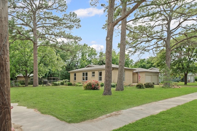 356 Bedford Ct E, Bedford, TX 76022 - view of property exterior with fence, brick siding, and a lawn