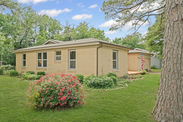 356 Bedford Ct E, Bedford, TX 76022 - view of side of property with a lawn