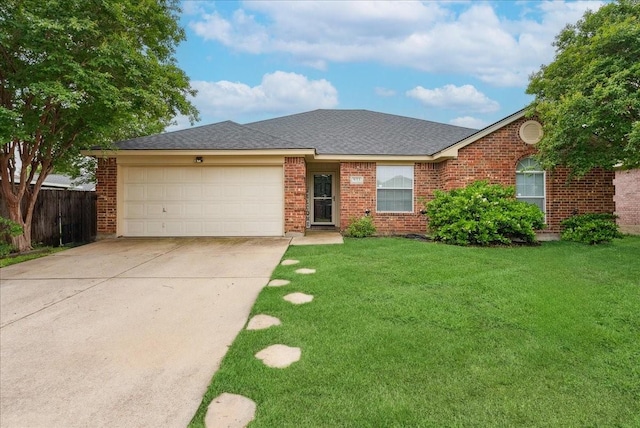 ranch-style house with driveway, a front yard, a garage, brick siding, and fence
