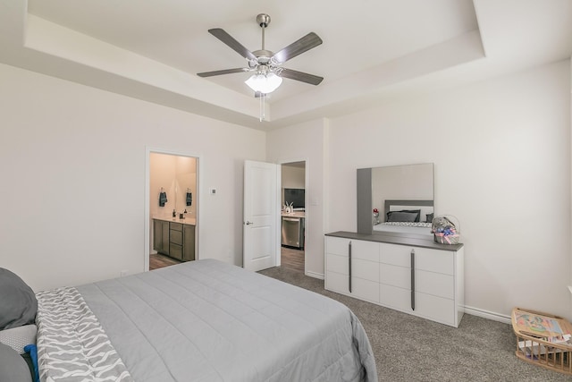 2825 Jasper Trl, Aubrey, TX 76227 - bedroom featuring a raised ceiling, ceiling fan, and dark carpet