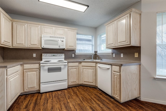 3804 Periwinkle Dr, Fort Worth, TX 76137 - kitchen featuring a sink, dark wood-style flooring, a textured ceiling, and white appliances