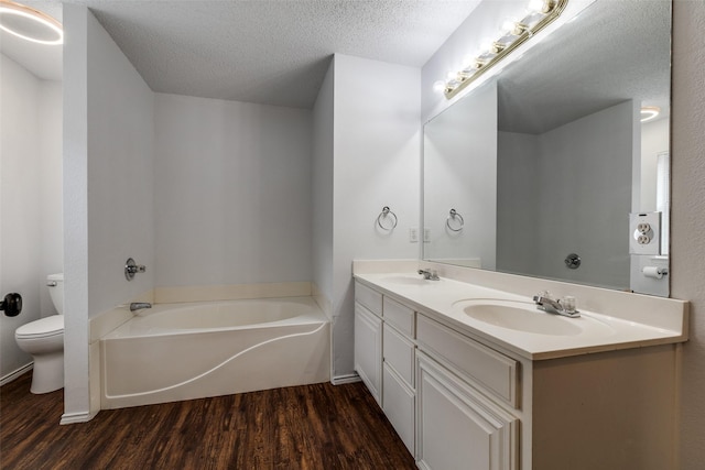 3804 Periwinkle Dr, Fort Worth, TX 76137 - full bathroom with toilet, wood finished floors, and a sink