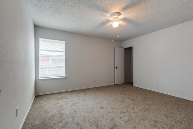 3804 Periwinkle Dr, Fort Worth, TX 76137 - carpeted empty room featuring a ceiling fan, baseboards, and a textured ceiling