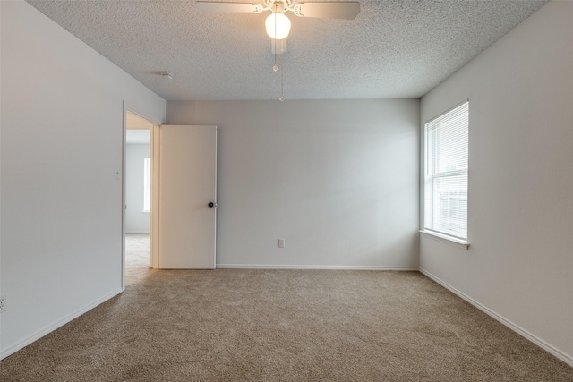 3804 Periwinkle Dr, Fort Worth, TX 76137 - carpeted empty room featuring baseboards, ceiling fan, and a textured ceiling
