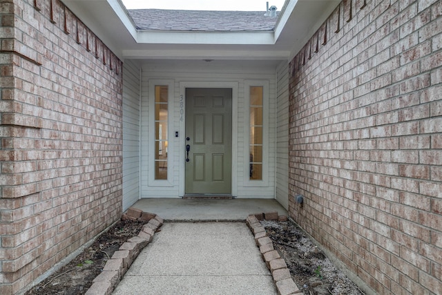 3804 Periwinkle Dr, Fort Worth, TX 76137 - entrance to property with a shingled roof and brick siding
