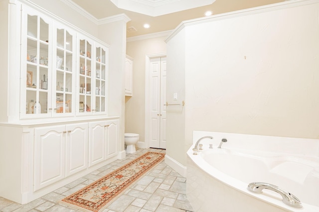full bathroom featuring crown molding, recessed lighting, a bath, and toilet