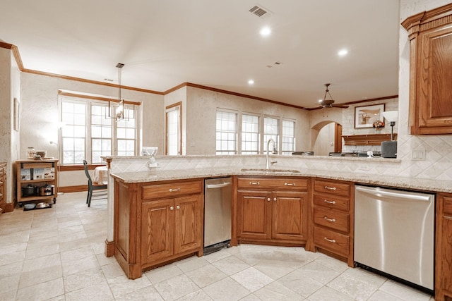 kitchen featuring a ceiling fan, visible vents, tasteful backsplash, stainless steel dishwasher, and a sink