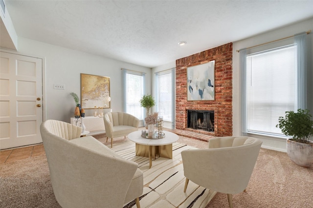 7510 Holly Hill Dr Unit 159, Dallas, TX 75231 - living area with carpet and a fireplace