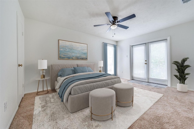 7510 Holly Hill Dr Unit 159, Dallas, TX 75231 - carpeted bedroom with access to outside, french doors, baseboards, and a ceiling fan