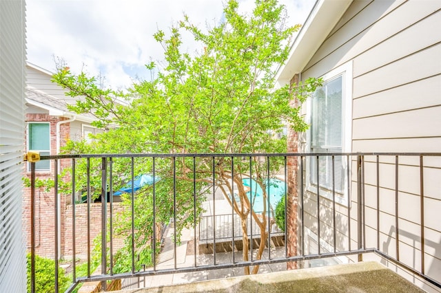 7510 Holly Hill Dr Unit 159, Dallas, TX 75231 - balcony featuring view of pool
