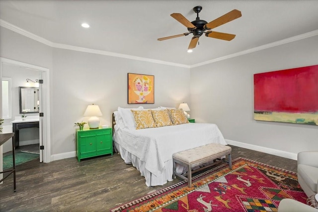 bedroom featuring crown molding, wood finished floors, baseboards, ensuite bathroom, and recessed lighting