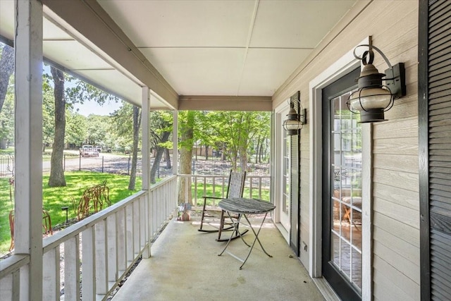 balcony featuring a porch