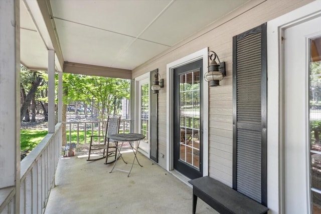 balcony featuring a porch
