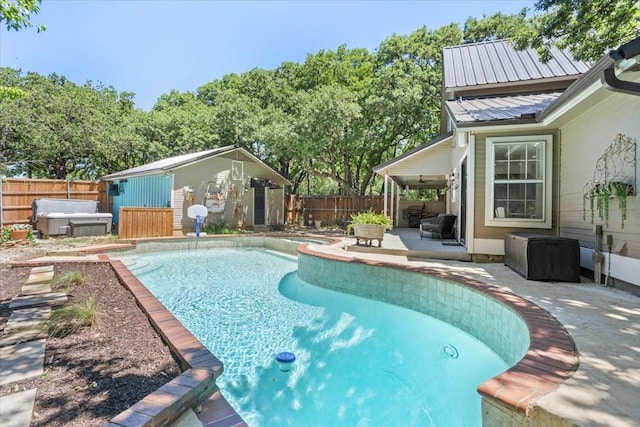 view of pool with an outdoor structure, a fenced backyard, a fenced in pool, a jacuzzi, and a patio area