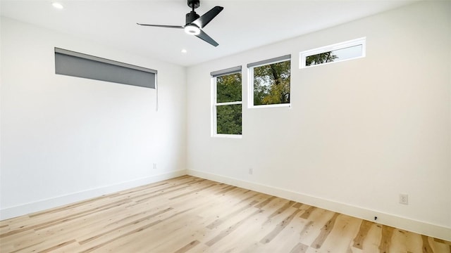 2316 Arroyo Ave, Dallas, TX 75219 - empty room with light wood finished floors, baseboards, recessed lighting, and a ceiling fan