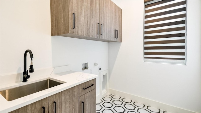 2316 Arroyo Ave, Dallas, TX 75219 - clothes washing area featuring cabinet space, washer hookup, and baseboards