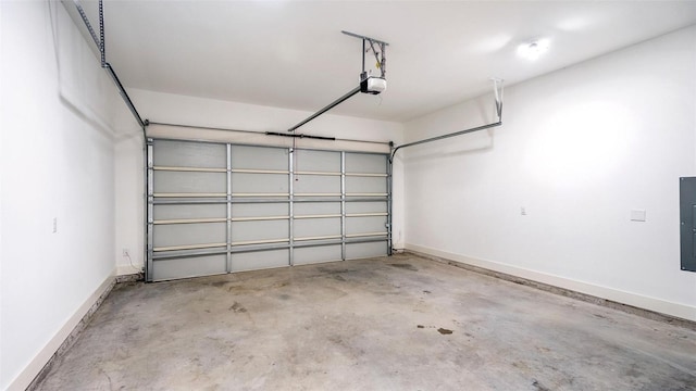 2316 Arroyo Ave, Dallas, TX 75219 - garage with a garage door opener, baseboards, and electric panel