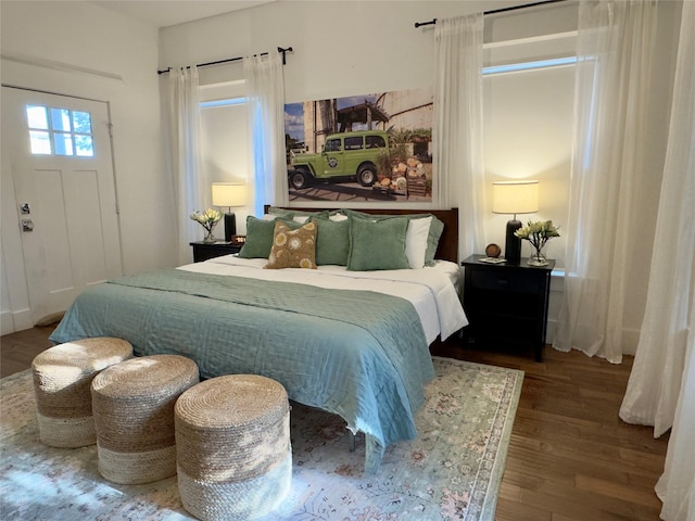 bedroom with wood finished floors