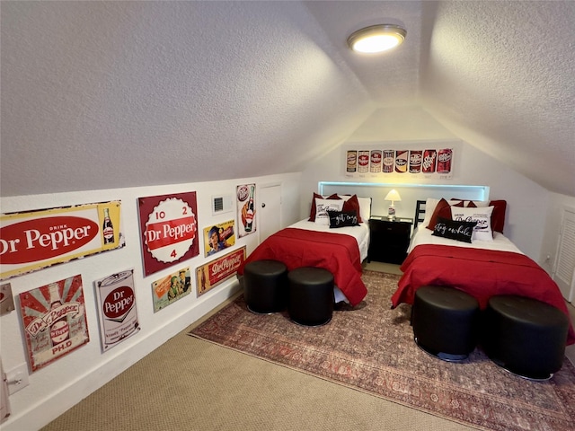 carpeted bedroom featuring a textured ceiling and vaulted ceiling