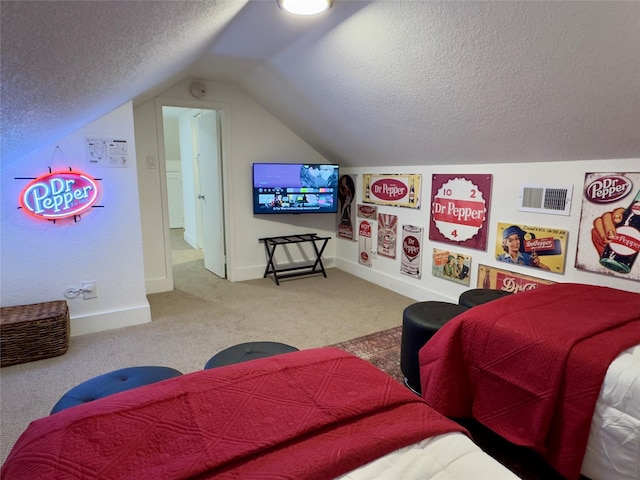 carpeted bedroom with visible vents, baseboards, a textured ceiling, and lofted ceiling