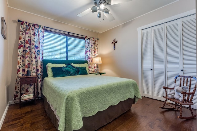 3150 Palmdale Cir, Farmers Branch, TX 75234 - bedroom featuring wood finished floors, a closet, ornamental molding, ceiling fan, and baseboards