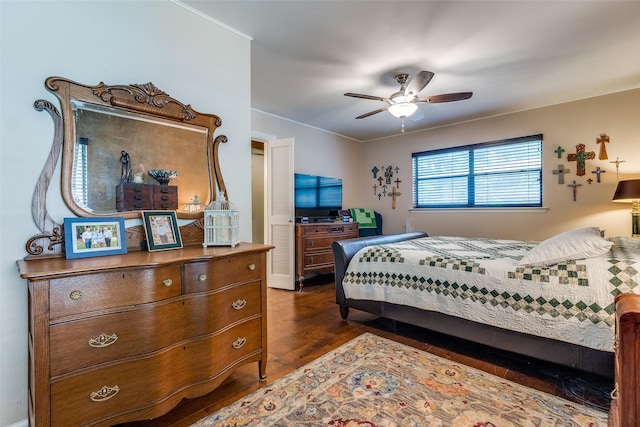 3150 Palmdale Cir, Farmers Branch, TX 75234 - bedroom featuring dark wood-style flooring and a ceiling fan