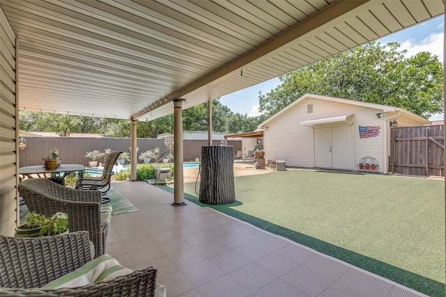 3150 Palmdale Cir, Farmers Branch, TX 75234 - fenced backyard with a patio area