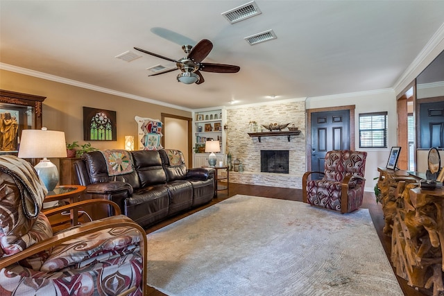 3150 Palmdale Cir, Farmers Branch, TX 75234 - living room featuring ceiling fan, ornamental molding, wood finished floors, and a fireplace