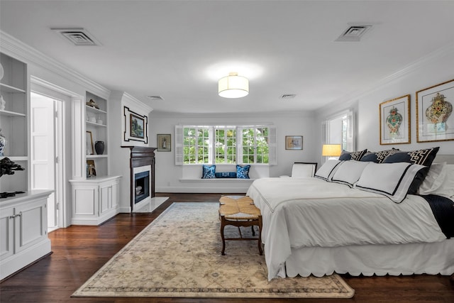 8 Westover Rd, Westover Hills, TX 76107 - bedroom with a fireplace with flush hearth, ornamental molding, dark wood-style floors, and visible vents