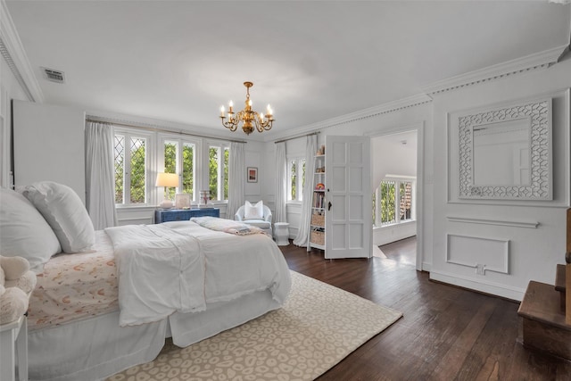 8 Westover Rd, Westover Hills, TX 76107 - bedroom featuring visible vents, dark wood-style flooring, crown molding, and an inviting chandelier