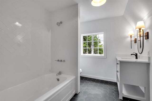 8 Westover Rd, Westover Hills, TX 76107 - bathroom featuring vanity, tile patterned flooring, toilet, baseboards, and washtub / shower combination