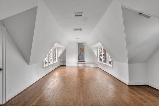 8 Westover Rd, Westover Hills, TX 76107 - additional living space with baseboards, lofted ceiling, and hardwood / wood-style floors