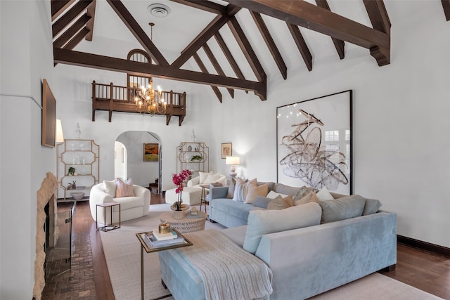 8 Westover Rd, Westover Hills, TX 76107 - living room featuring an inviting chandelier, beam ceiling, arched walkways, high vaulted ceiling, and visible vents