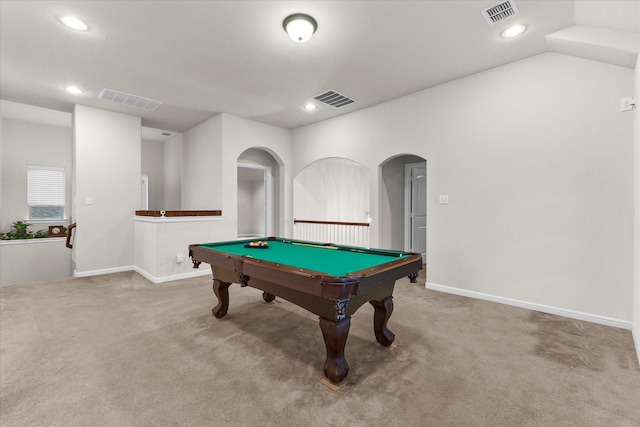 rec room featuring arched walkways, carpet, and visible vents
