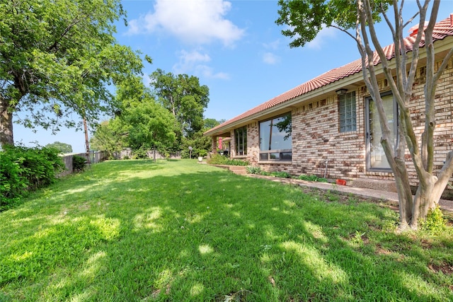 view of yard featuring a fenced backyard