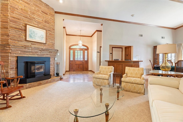 carpeted living room with crown molding, baseboards, and a high ceiling