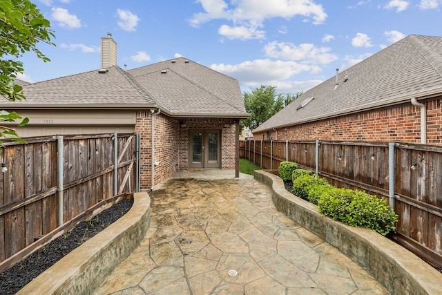 5312 Oakley Rd, Mckinney, TX 75070 - view of patio featuring french doors and a fenced backyard