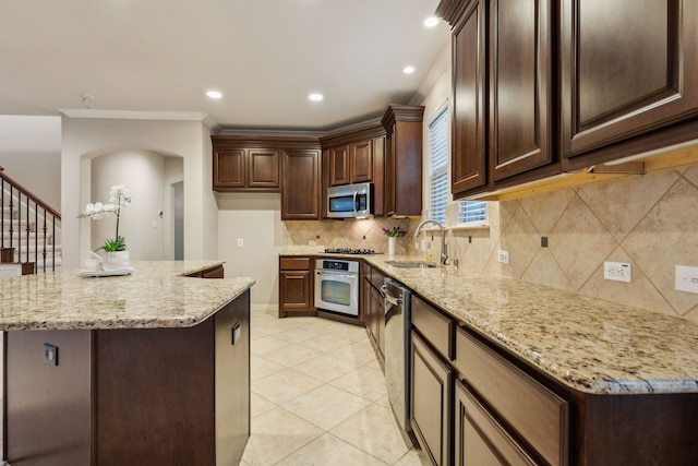 5312 Oakley Rd, Mckinney, TX 75070 - kitchen featuring wall oven, dishwasher, ornamental molding, a sink, and backsplash