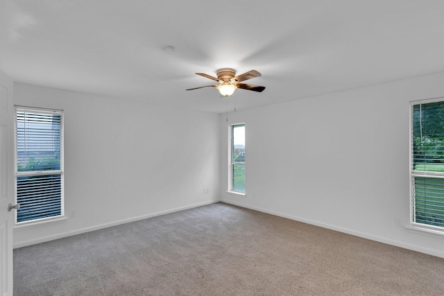 503 Bluebonnet Ln, Red Oak, TX 75154 - spare room featuring carpet floors, ceiling fan, and baseboards
