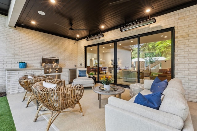 view of patio / terrace with a ceiling fan, an outdoor living space, area for grilling, and a grill