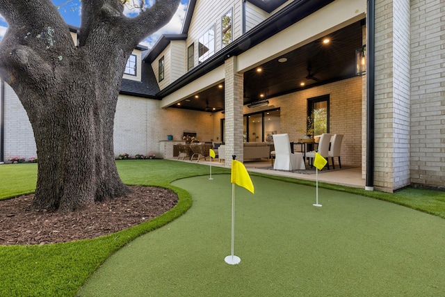 view of home's community with a patio