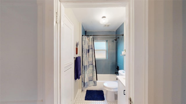 bathroom featuring shower / tub combo, tile patterned flooring, toilet, and visible vents