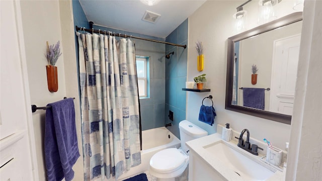 bathroom featuring vanity, shower / bath combination with curtain, toilet, and visible vents
