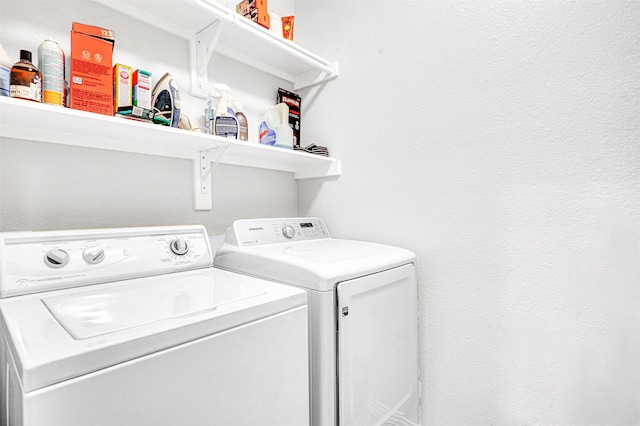 laundry area with washer and dryer and laundry area
